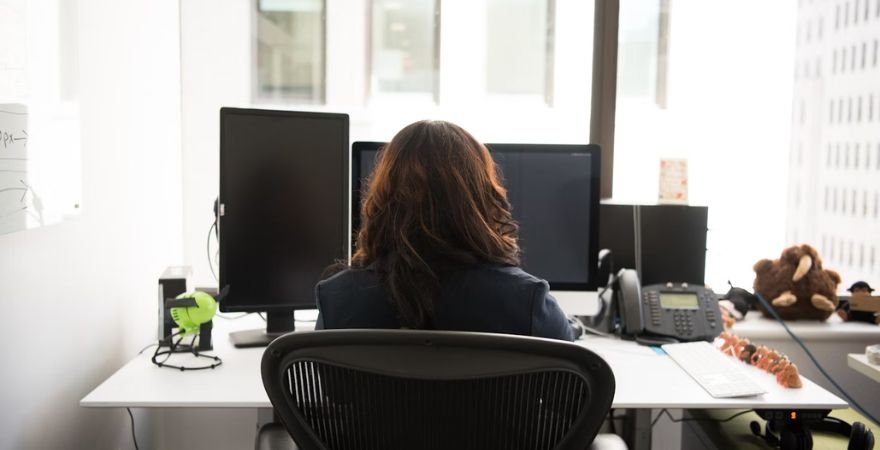 woman working at office desk