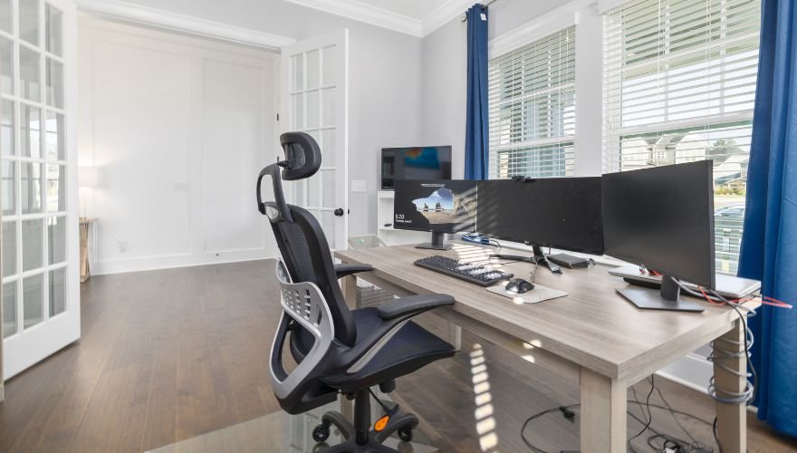 Home office with an office chair and desk 